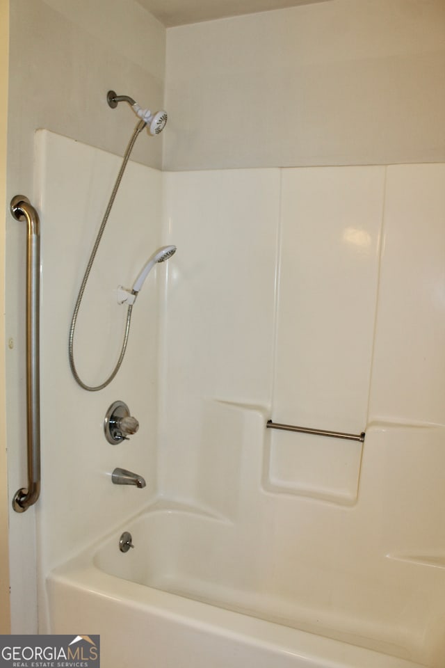 bathroom with shower / bathtub combination