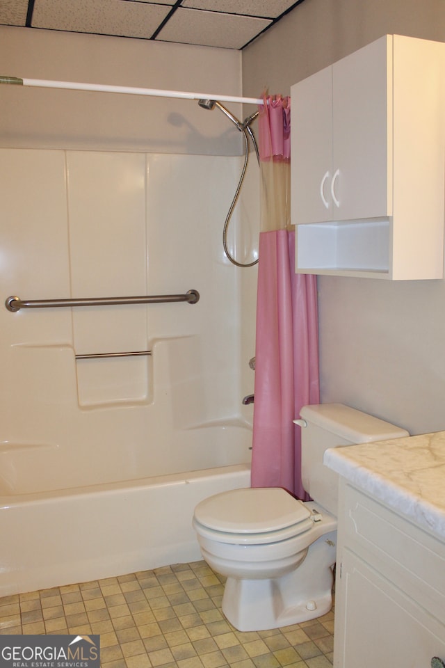 full bathroom with shower / tub combo, toilet, tile patterned floors, and vanity