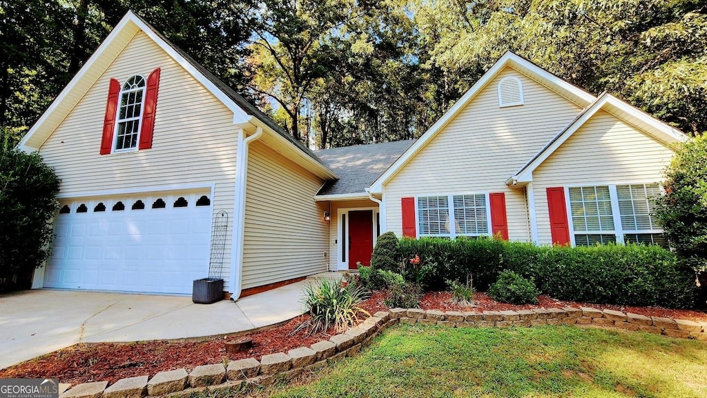 view of front of property featuring a garage