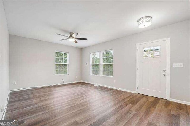 entryway featuring ceiling fan and hardwood / wood-style flooring