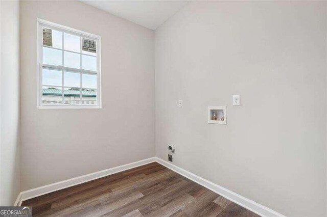 laundry area with washer hookup and dark hardwood / wood-style floors