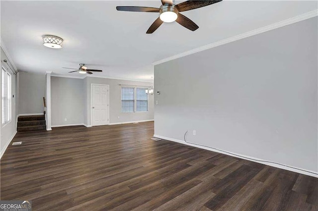 unfurnished living room featuring ceiling fan, dark wood-type flooring, and crown molding