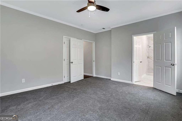 unfurnished bedroom featuring connected bathroom, crown molding, ceiling fan, and carpet floors