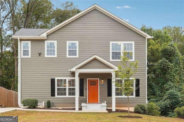 view of front of home with a front lawn