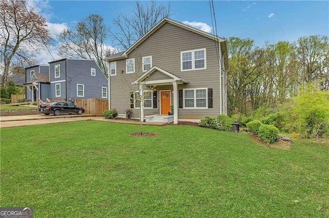 view of front of home featuring a front yard