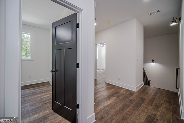 hall featuring dark hardwood / wood-style floors