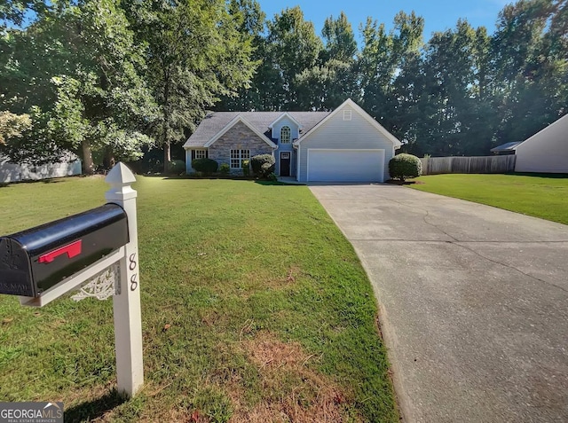 single story home featuring a garage and a front yard