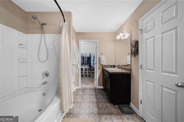 bathroom featuring vanity and shower / bath combo