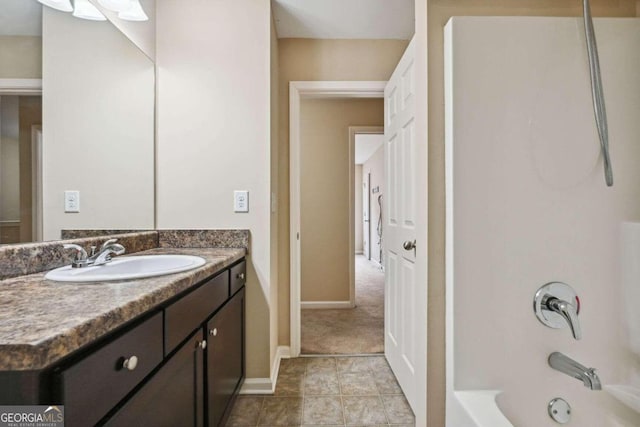 bathroom with shower / tub combination and vanity