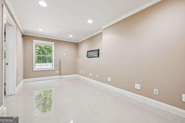 tiled empty room with crown molding