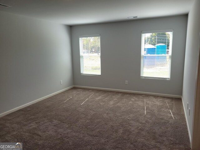 view of carpeted spare room