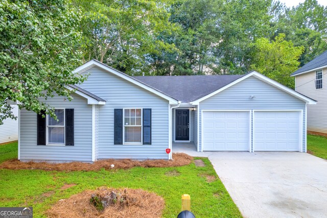 single story home with a front lawn and a garage