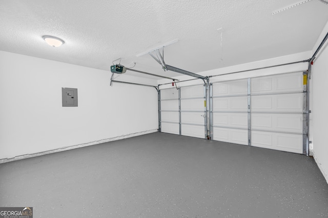 garage featuring a garage door opener and electric panel