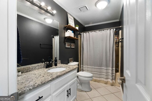 bathroom featuring tile patterned flooring, curtained shower, vanity, and toilet