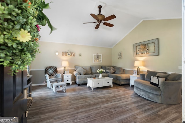 living room with lofted ceiling, dark wood-type flooring, and ceiling fan