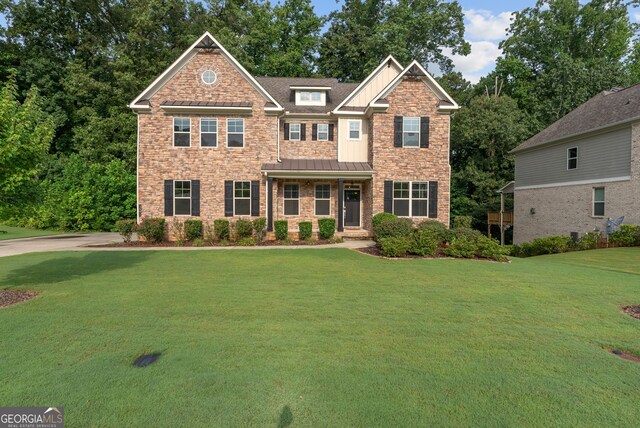 view of front of property with a front lawn