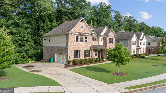 craftsman-style home with a garage and a front yard