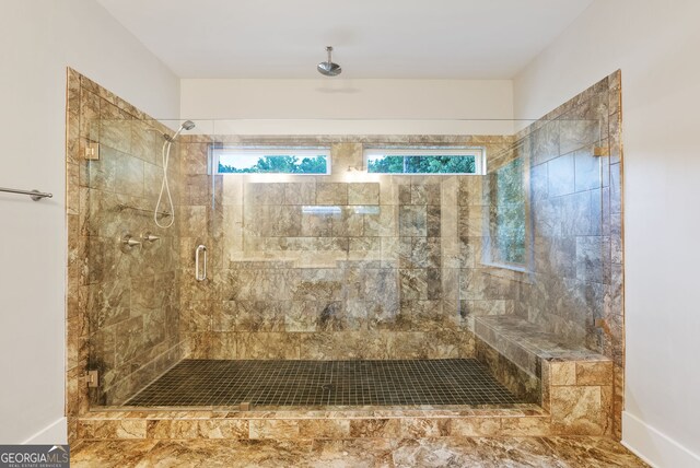 bathroom with walk in shower