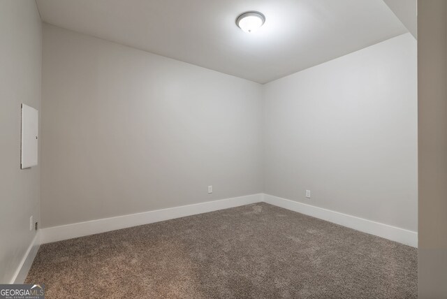 empty room with carpet flooring