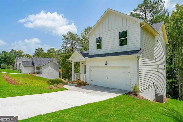 view of front of house featuring a garage and a front yard