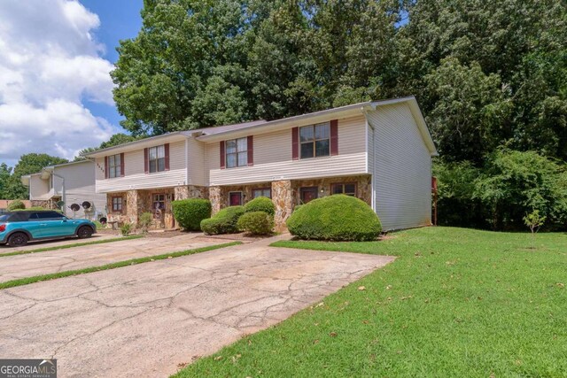 2498 Hidden Cove Ct Unit D, Gainesville, GA 30501 - view of front of property with stone siding and a front yard