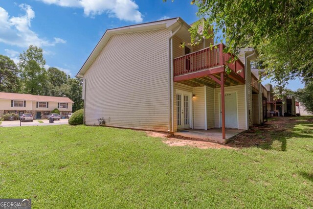 2498 Hidden Cove Ct Unit D, Gainesville, GA 30501 - view of home's exterior with french doors, a yard, and a wooden deck