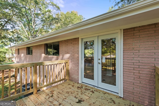 deck featuring french doors and central AC unit