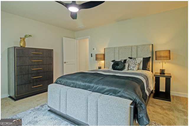 carpeted bedroom featuring ceiling fan