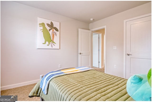 bedroom featuring carpet flooring