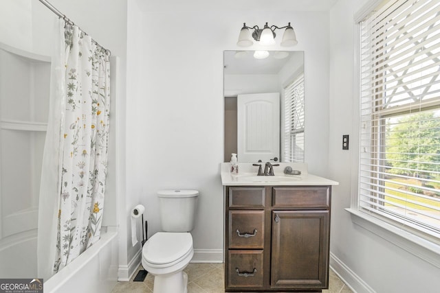 full bathroom with tile patterned floors, vanity, shower / bath combo, and toilet