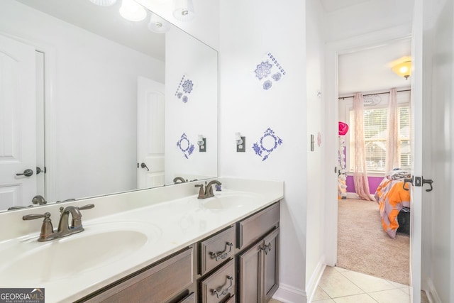 bathroom with dual bowl vanity and tile patterned floors