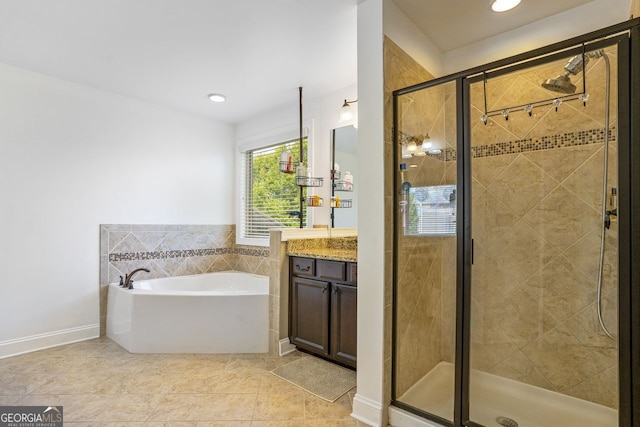 bathroom with shower with separate bathtub, tile patterned flooring, and vanity