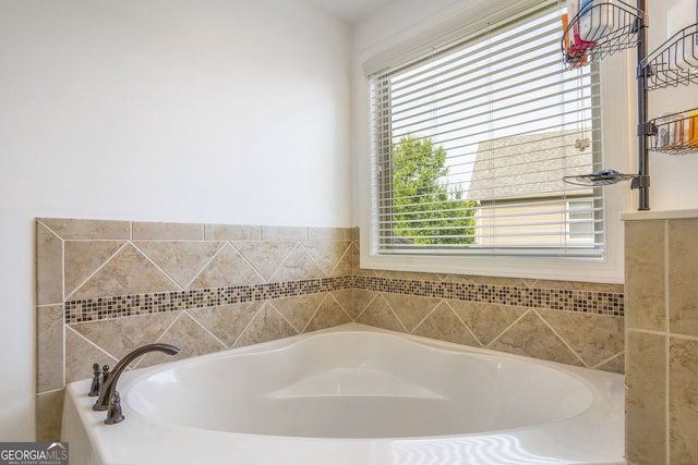 bathroom with a tub to relax in