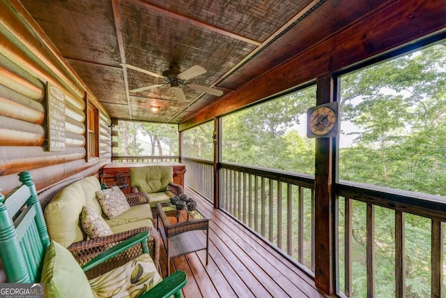 sunroom / solarium with ceiling fan and a wealth of natural light