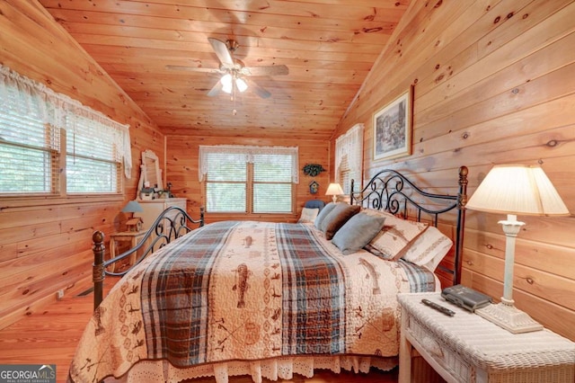 unfurnished bedroom featuring ceiling fan, vaulted ceiling, and wood ceiling