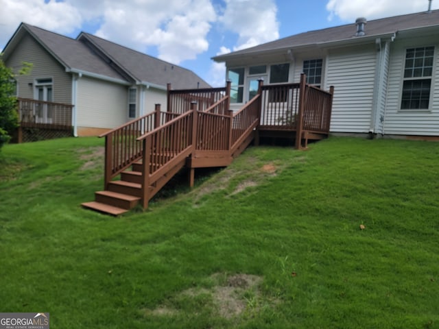 view of yard featuring a deck