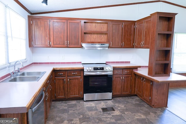 kitchen with lofted ceiling, sink, appliances with stainless steel finishes, kitchen peninsula, and extractor fan