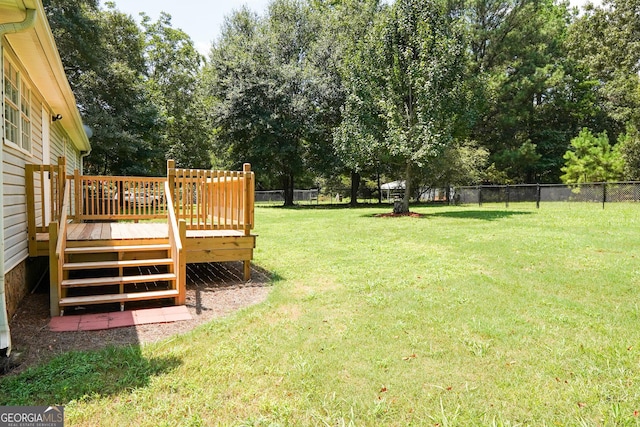 view of yard featuring a deck