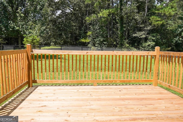 deck featuring a yard