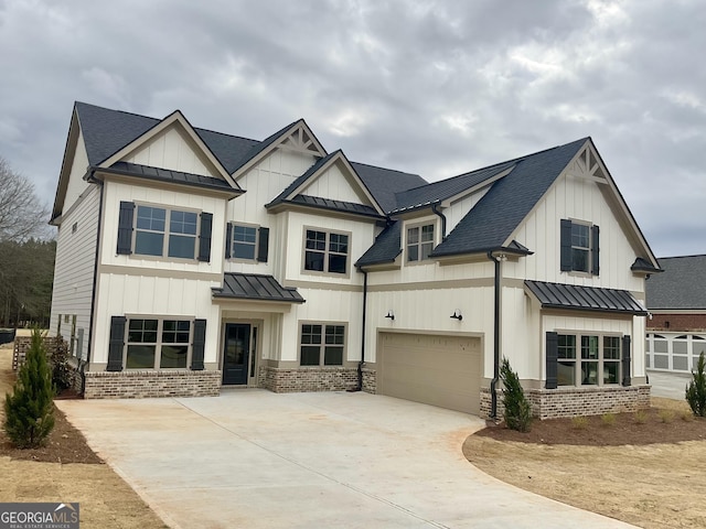 modern farmhouse style home with driveway, a standing seam roof, metal roof, and board and batten siding