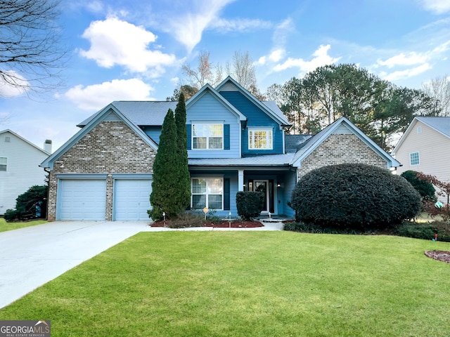 view of front facade with a garage and a front lawn