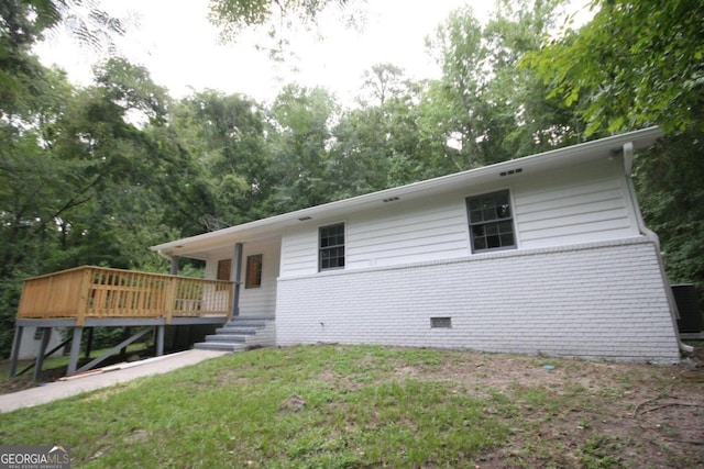 view of front of house featuring a deck