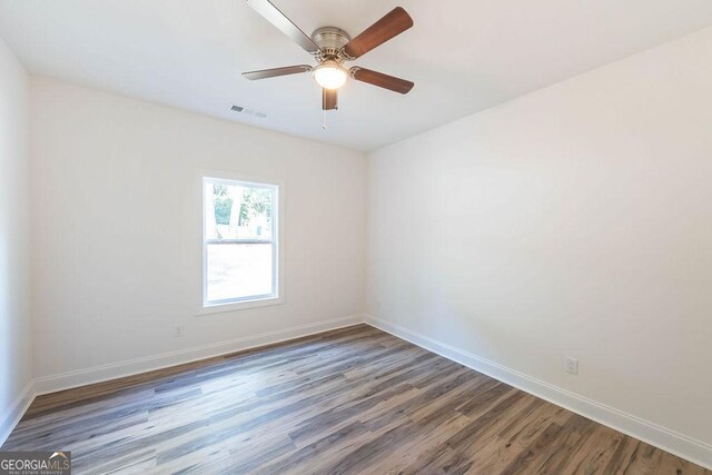 unfurnished room featuring wood-type flooring and ceiling fan