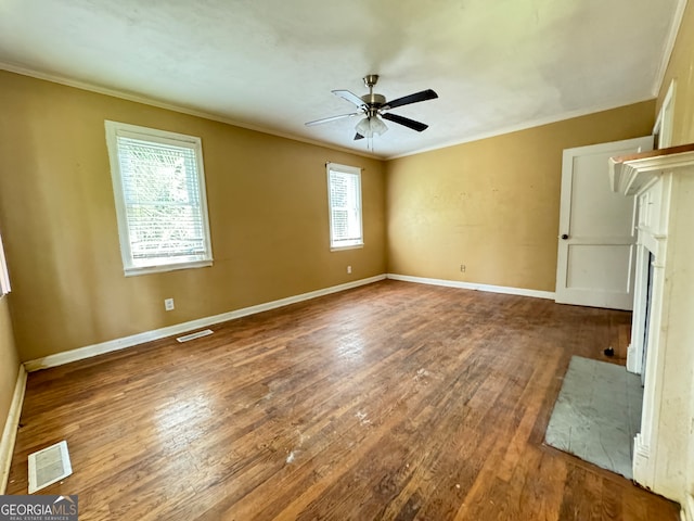 unfurnished living room with ceiling fan, plenty of natural light, crown molding, and hardwood / wood-style flooring