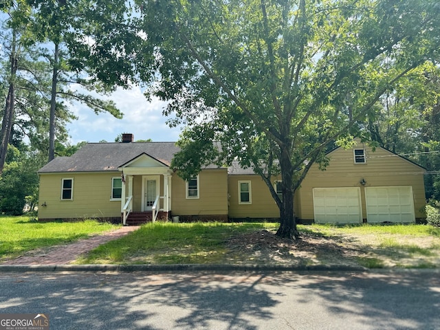 view of front of home featuring a garage