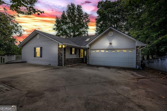 ranch-style home with a garage