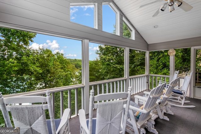 sunroom / solarium with vaulted ceiling