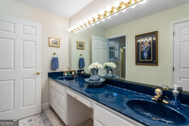 bathroom featuring vanity and tile patterned floors