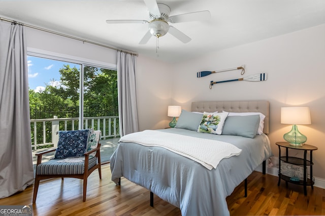 bedroom featuring access to outside, ceiling fan, and hardwood / wood-style flooring