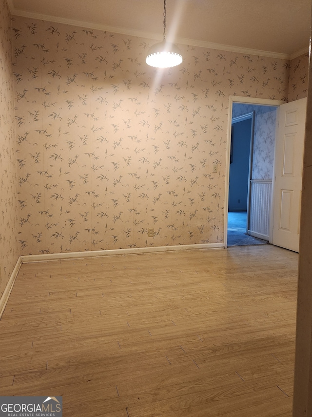 unfurnished room featuring wood-type flooring